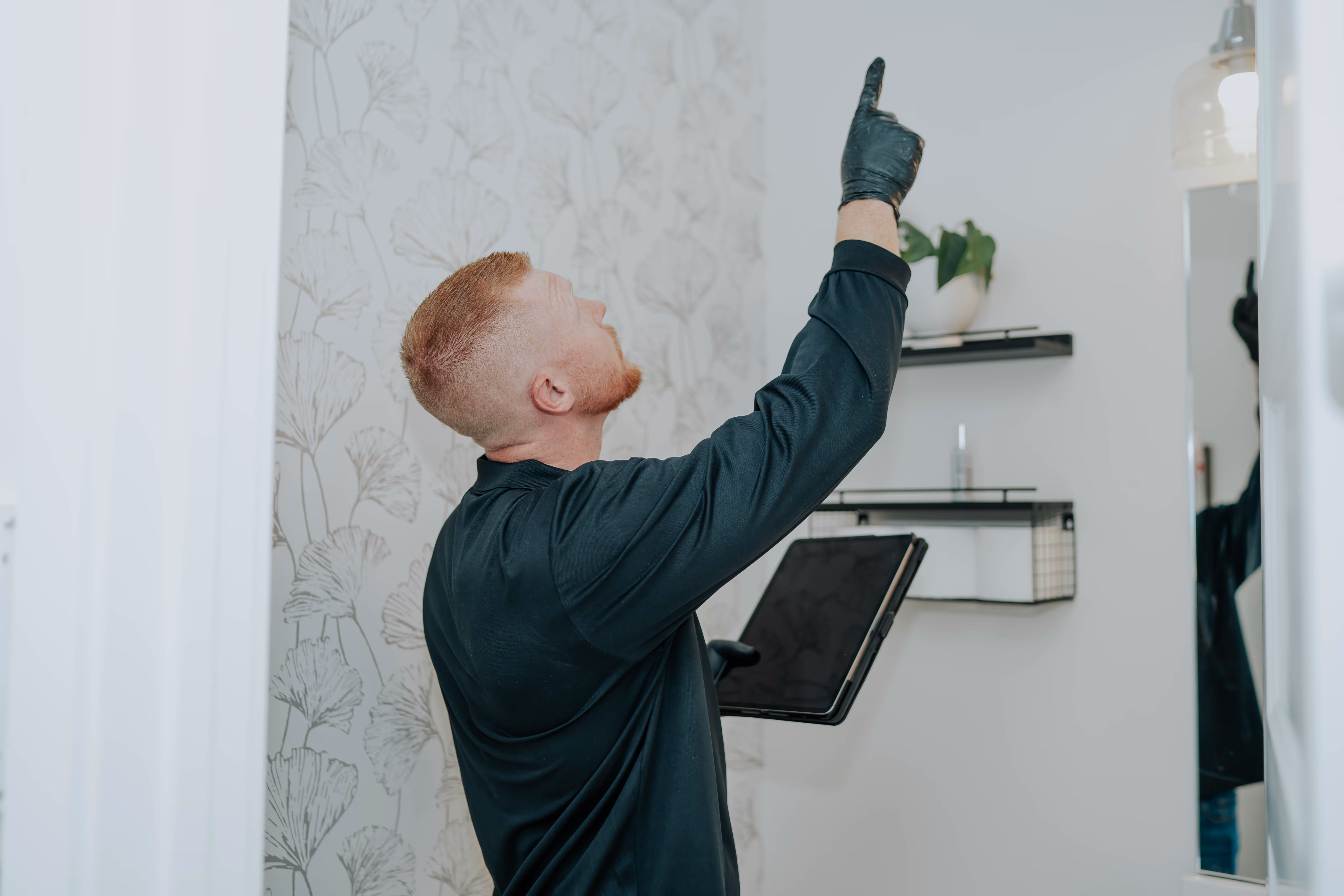 Pure Mold Masters technician conducting a full property mold inspection